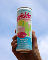 Hand holding Pricklee - Prickly Pear Cactus Water