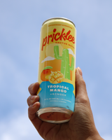 Hand holding Pricklee - Tropical Mango Cactus Water