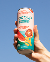 Hand holding Recoup- Watermelon Blood Orange + Ginger
