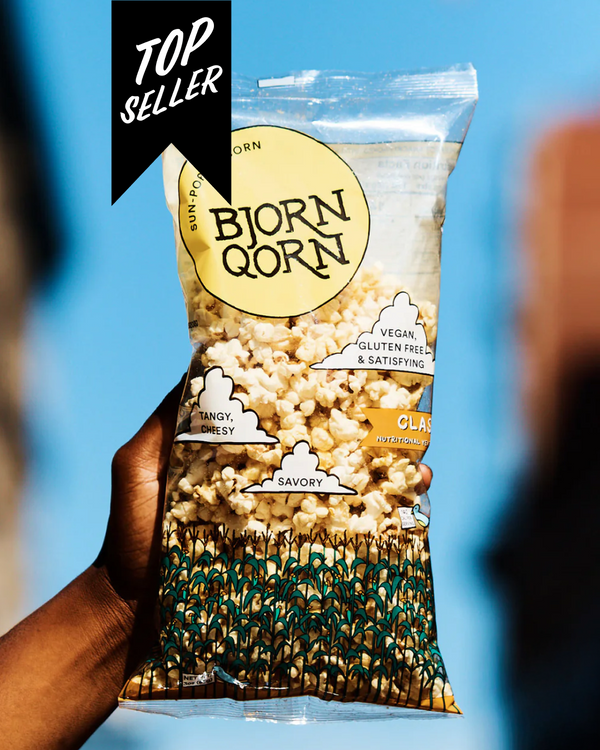 Large bag of Bjorn Qorn's Classic popcorn with a 'Top Seller' banner. 
