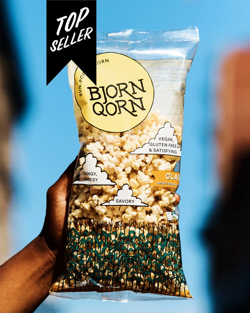 Large bag of Bjorn Qorn's Classic popcorn with a 'Top Seller' banner. 