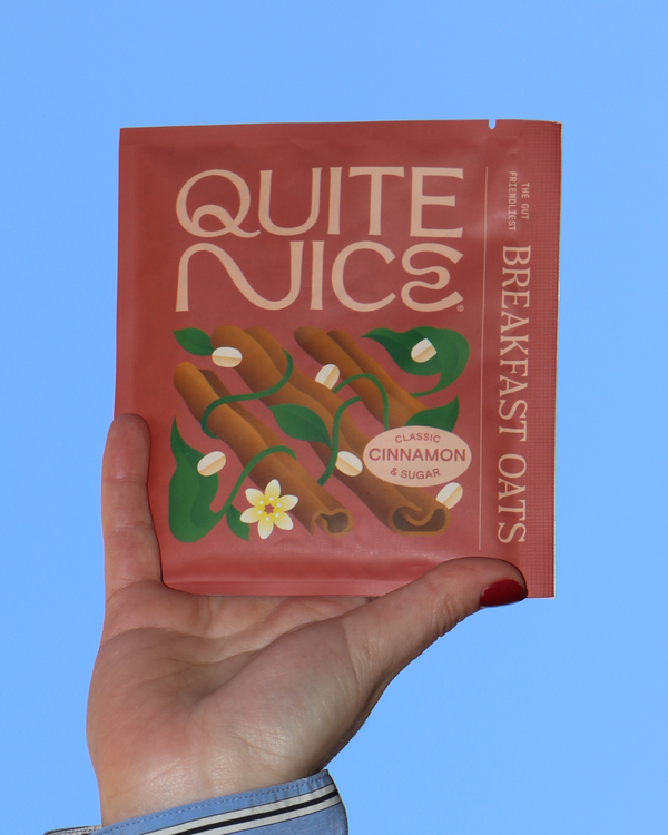 Hand holding Quite Nice - Cinnamon & Maple Sugar Prebiotic Oatmeal